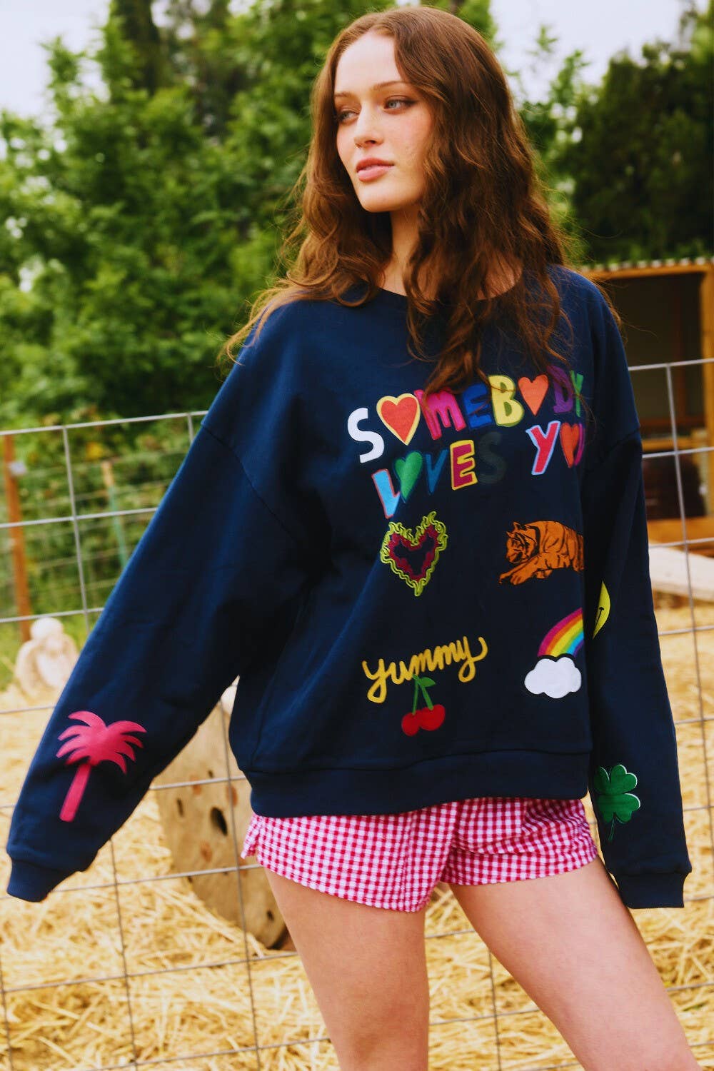 'Somebody Loves You' Graphic Sweatshirts